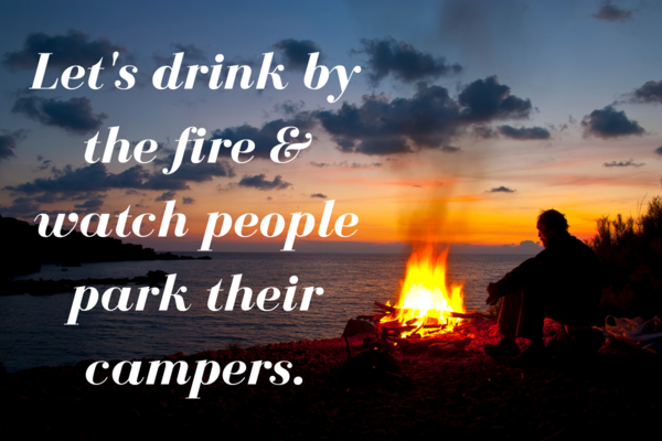 A person sitting by a large bonfire on a beach at sunset, with text overlay about relaxing by the fire.